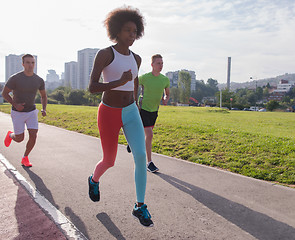 Image showing multiethnic group of people on the jogging