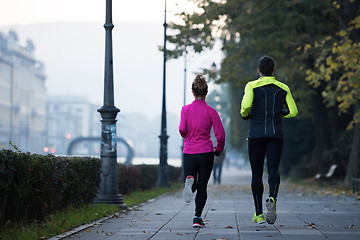 Image showing young  couple jogging