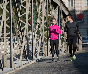 Image showing young  couple jogging