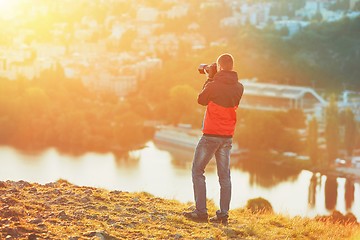 Image showing Photographer at the sunrise