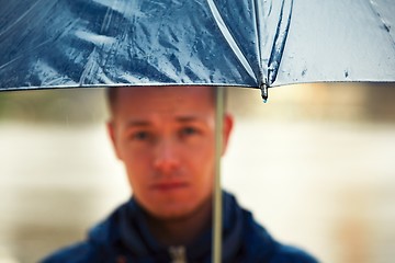 Image showing Man in rainy day