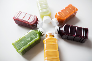 Image showing bottles with different fruit or vegetable juices