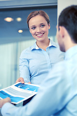 Image showing group of smiling businesspeople meeting in office