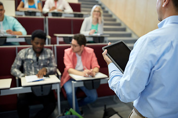 Image showing teacher with tablet pc and students at lecture