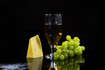 Image showing Wine And Grapes On Black