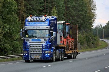 Image showing Customized Scania V8 Semi Hauls Roadworks Machinery