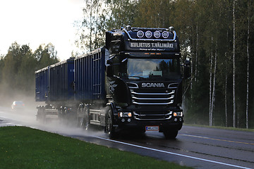 Image showing Scania V8 Trucking on Rainy Road