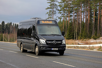 Image showing Black Mercedes-Benz Sprinter Minibus on the Road