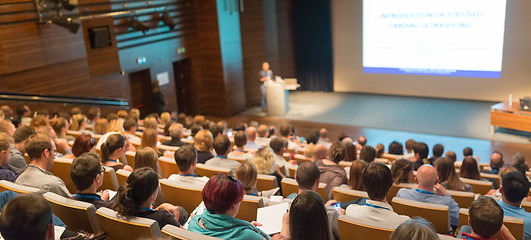 Image showing Business speaker giving a talk in conference hall.