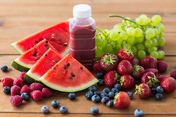 Image showing bottle with fruit and berry juice or smoothie