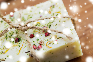 Image showing close up of handmade soap bars on wood