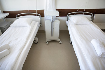 Image showing hospital ward with clean empty beds