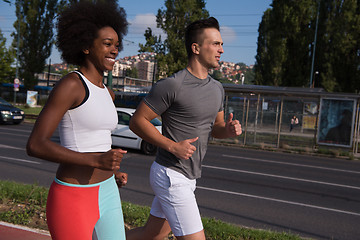 Image showing multiethnic group of people on the jogging