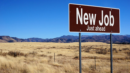 Image showing New Job brown road sign