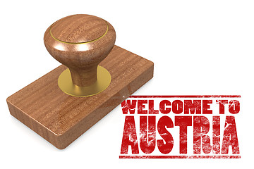 Image showing Red rubber stamp with welcome to Austria