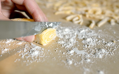 Image showing Woman\'s hands knead dough