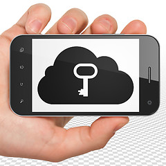 Image showing Cloud networking concept: Hand Holding Smartphone with Cloud With Key on display