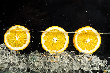 Image showing Oranges, Water And Ice