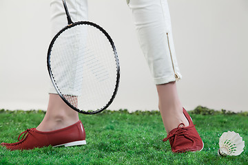 Image showing Woman\'s Legs And Badminton Racket