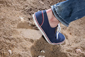 Image showing Man\'s Legs And Footprint On The Sand