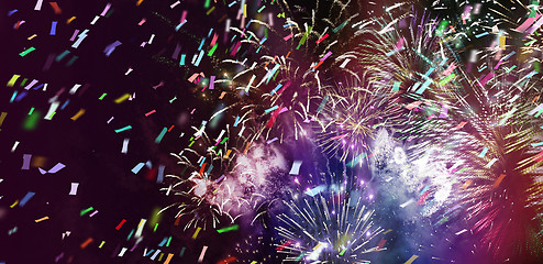 Image showing multicolor fireworks and ticker tapes