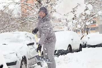 Image showing Man shoveling snow in winter.