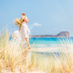 Image showing Free Happy Woman Enjoying Sun on Vacations.