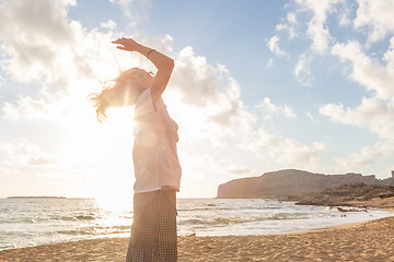 Image showing Relaxed Happy Woman Enjoying Sun on Vacations.