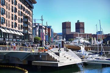 Image showing OSLO, NORWAY – AUGUST 17, 2016: People walking on modern distr