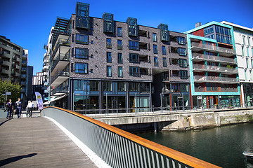 Image showing OSLO, NORWAY – AUGUST 17, 2016: People walking on modern distr