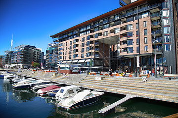 Image showing OSLO, NORWAY – AUGUST 17, 2016: People walking on modern distr