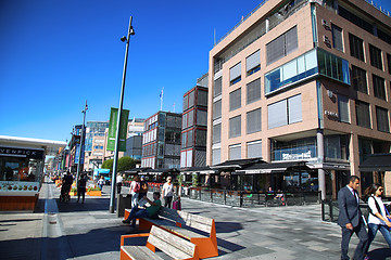 Image showing OSLO, NORWAY – AUGUST 17, 2016: People walking on modern distr