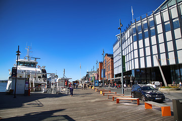 Image showing OSLO, NORWAY – AUGUST 17, 2016: People walking on modern distr