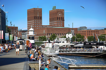 Image showing OSLO, NORWAY – AUGUST 17, 2016: People walking on modern distr