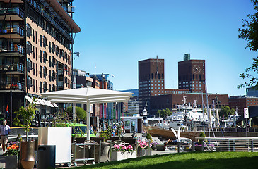 Image showing OSLO, NORWAY – AUGUST 17, 2016: People walking on modern distr