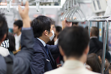 Image showing Passengers traveling by Tokyo metro.