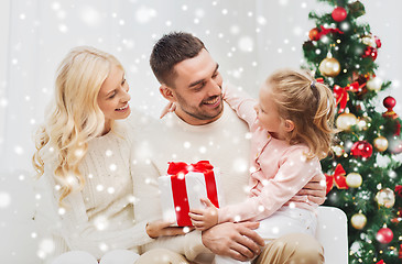 Image showing happy family at home with christmas tree