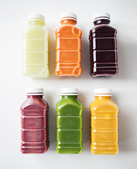 Image showing bottles with different fruit or vegetable juices