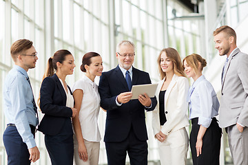 Image showing business people with tablet pc computer at office