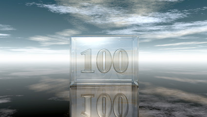 Image showing number one hundred in glass cube under cloudy sky - 3d rendering