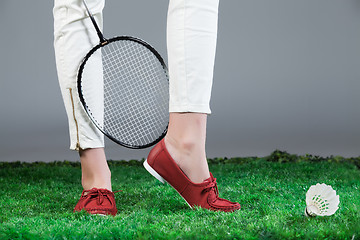 Image showing Woman\'s Legs And Badminton Racket