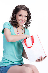 Image showing Young Emotional Woman With Paper Bag