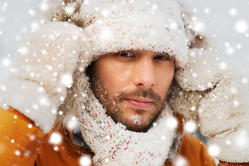 Image showing face of man in winter clothes outdoors