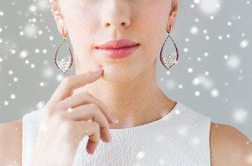 Image showing close up of beautiful woman face with earrings