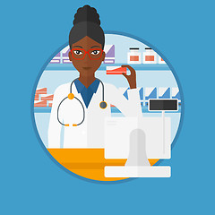 Image showing Pharmacist showing some medicine.