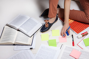 Image showing Woman\'s Legs, Books And Stickers