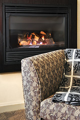 Image showing Fireplace and armchair