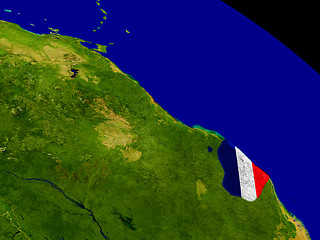 Image showing French Guiana with flag on Earth