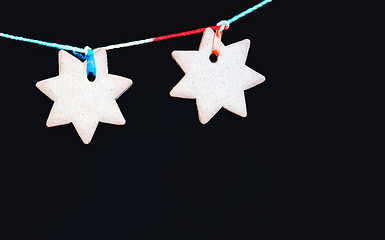 Image showing Black Greeting Background With Gingerbread