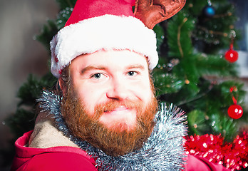Image showing Bearded Man In A Red Suit Of Santa Claus 